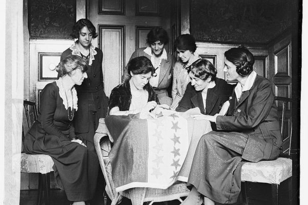 Sewing Stars on Suffrage Flag